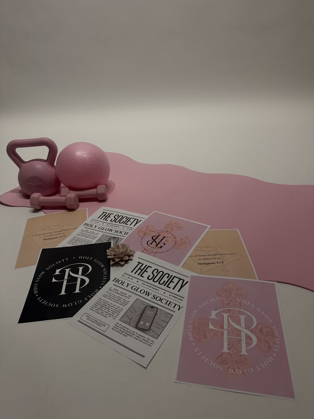 Holy Glow Society flyers, The Society newspaper and pink weights